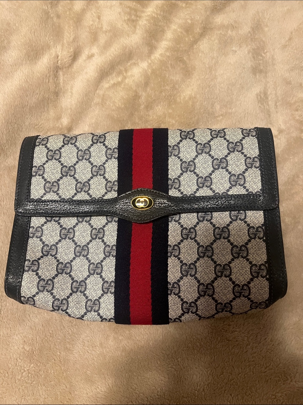 Gucci GG Supreme Canvas Clutch in Navy and Red Stripe